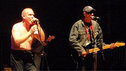 Two members of Heavy Load on stage