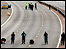 Police search the M40 after biker murder