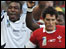 Kele Leawere celebrates as Wales"s James Hook looks dejected