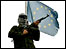 A Palestinian gunman on the roof of the EU office in Gaza