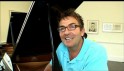 Bradley by the piano