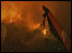 Firefighters tackle a blaze after a jet crashes in Sao Paulo