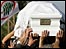 Pierre Gemayel's coffin is carried in his home village