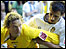 Paul McKenna (l) tussles with Leeds' Liam Miller